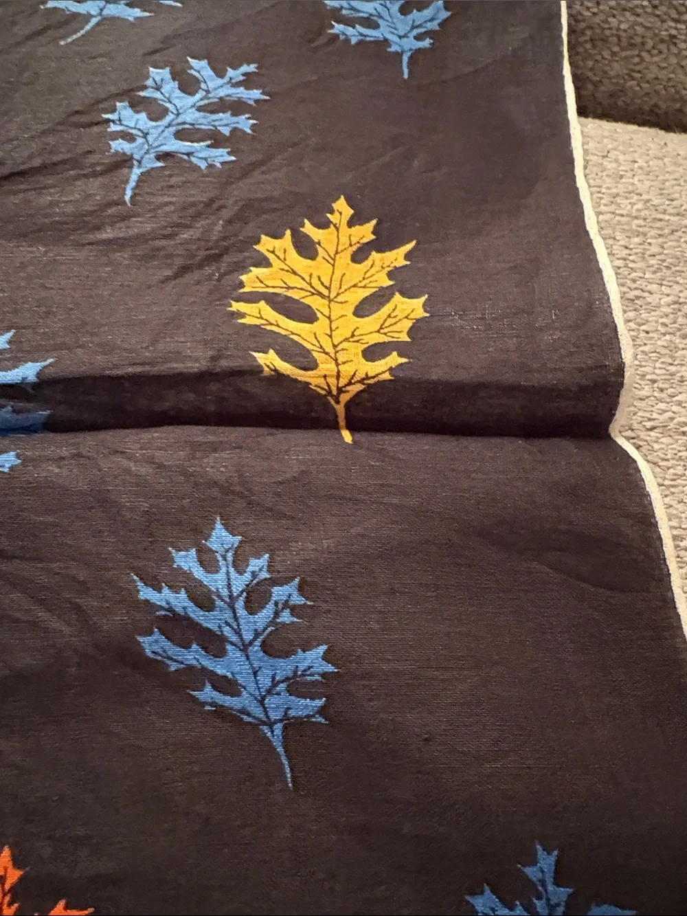 Fashionable Black Leaf-Print Scarf with Blue, Yellow & Orange Accents